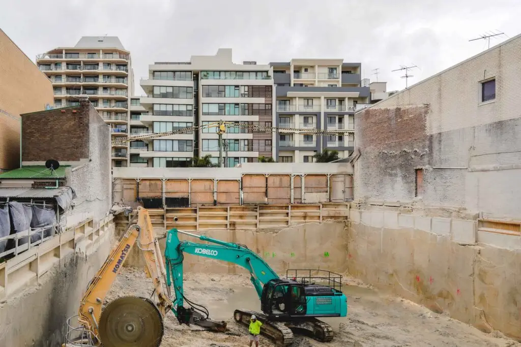 MESO Solutions installing lagging and sleeper walls over rock at a Randwick construction site.