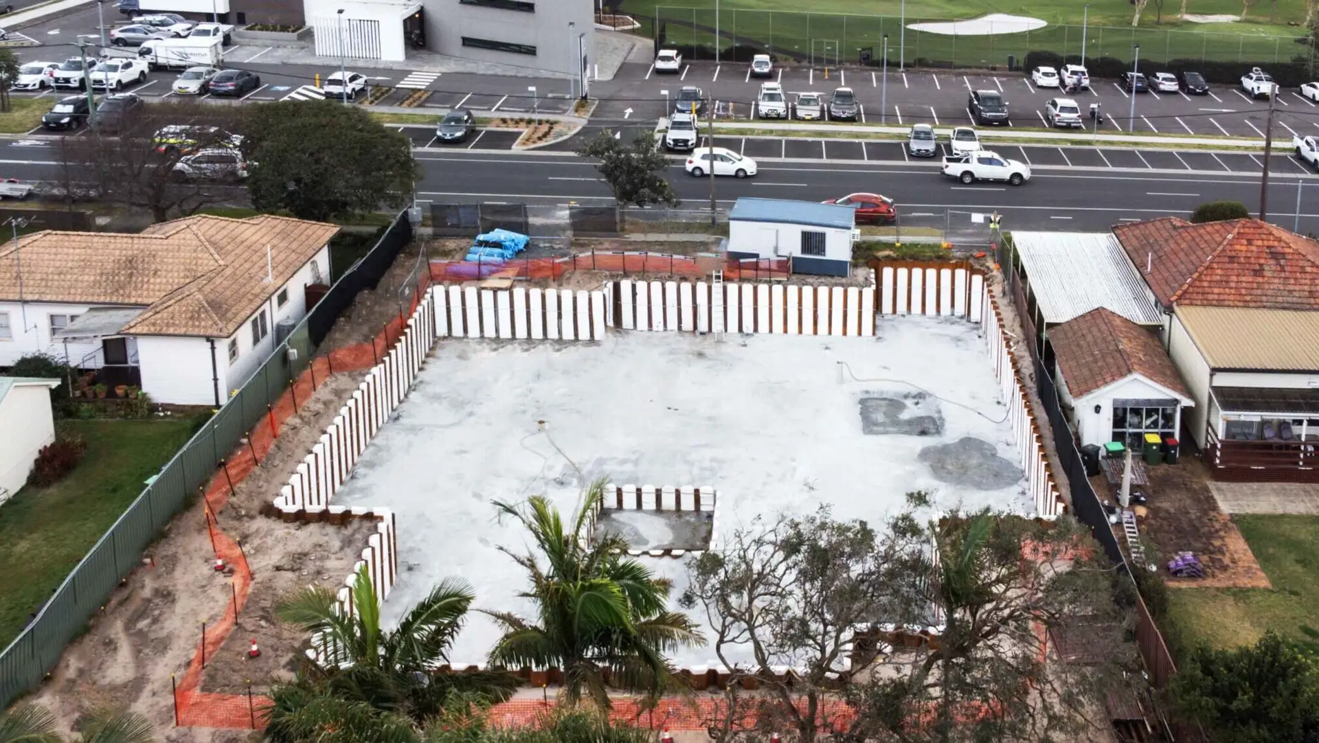 Smooth and clean walls at a construction site prepared for the application of a waterproofing membrane.