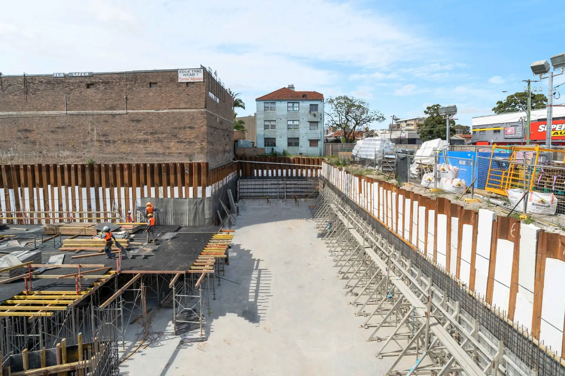 Installation of MESOForm formwork system in progress for reinforced concrete basement walls.