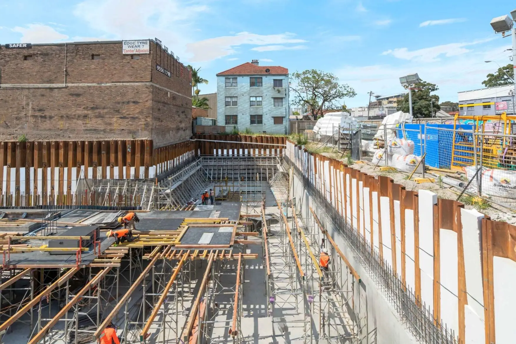 Completed reinforced concrete walls installed by MESO Solutions using MESOForm system for a residential basement.